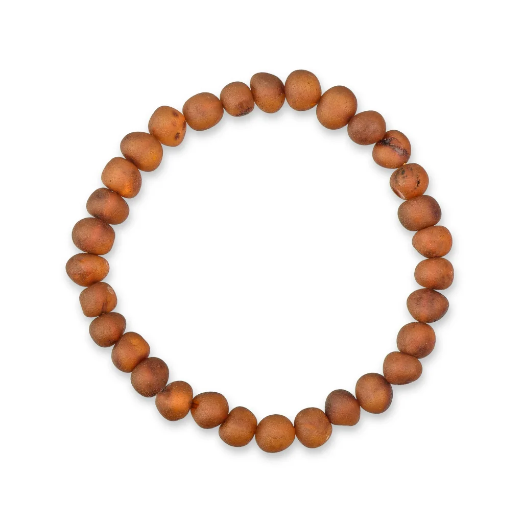 Handmade Baltic amber bracelet with matte earthy beads on elastic, perfect for everyday or special occasions.