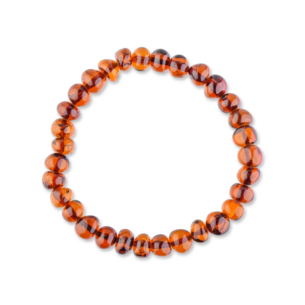 Genuine amber bracelet with natural inclusions, polished beads, and elastic for timeless elegance.