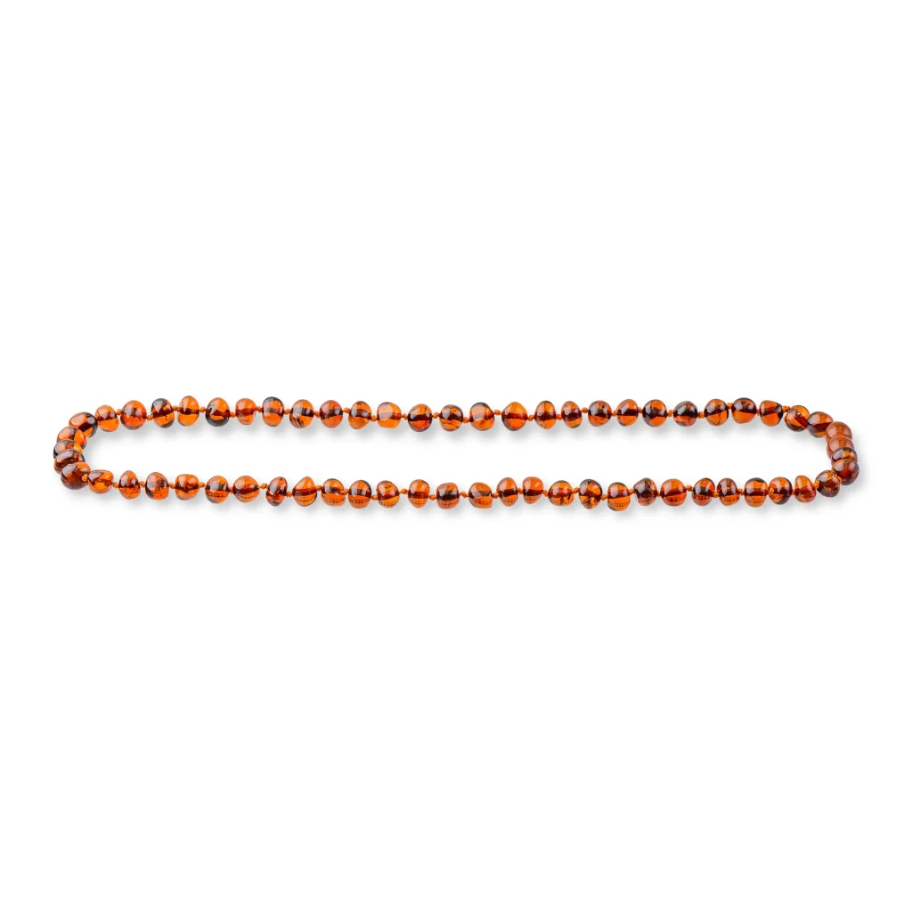 Polished Baltic amber beads in warm cognac tones, elegant and handcrafted for timeless beauty.