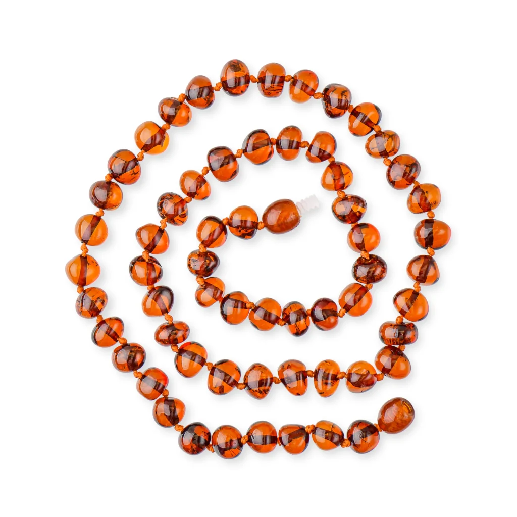 Handmade Baltic amber necklace with warm cognac beads, showcasing natural beauty and artisanal craftsmanship.