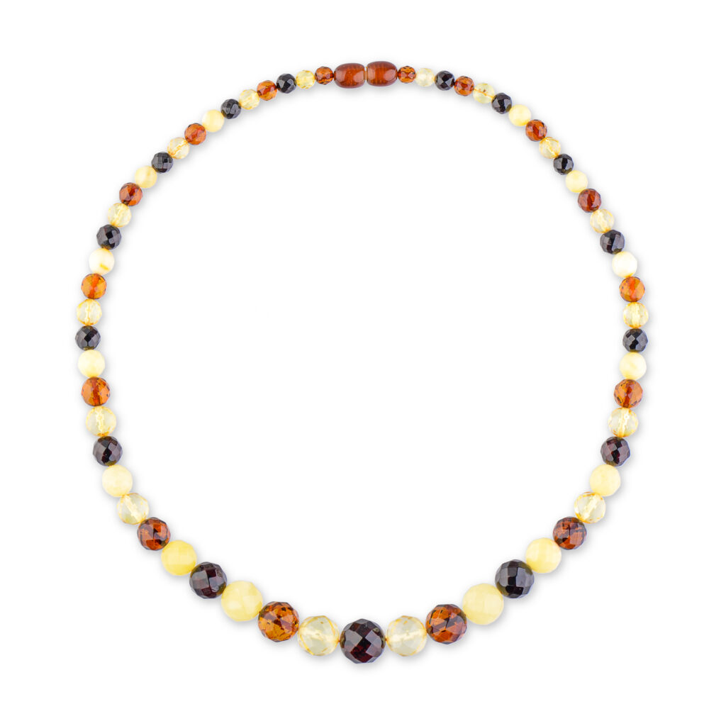 Natural Baltic amber necklace, handmade, faceted sphere, multi color, bead size varies, on the mannequin