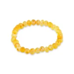 Bright yellow Baltic amber bead bracelet on elastic, perfect for casual or elegant wear.