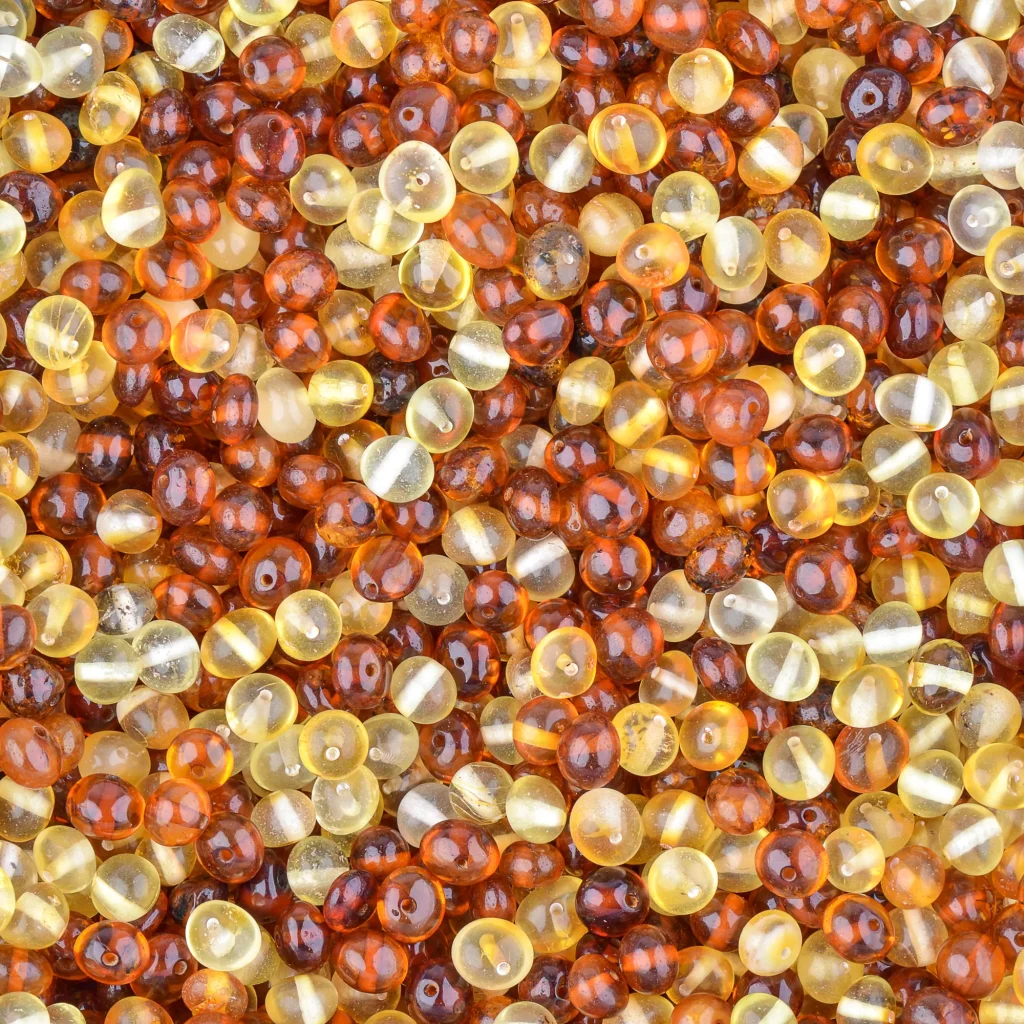 Polished bicolour loose amber beads