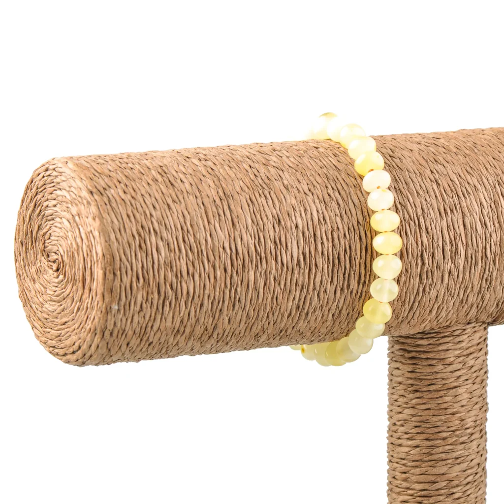 Polished butter color bracelet on elastic thread