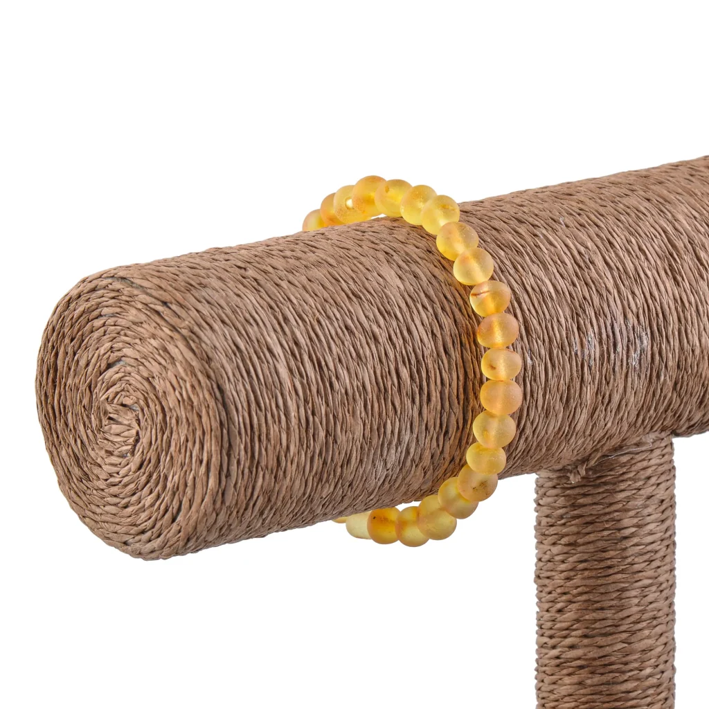 Unpolished honey color bracelet on elastic thread