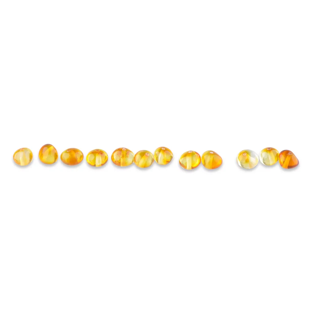 Polished honey color loose amber beads