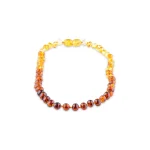 Polished teething amber necklace rainbow light