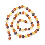 Handmade Baltic amber necklace with brown beads, natural, elegant, and artisanal jewelry accessory.