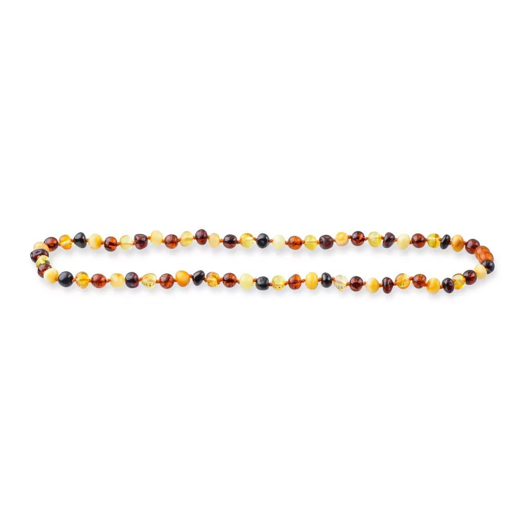 Handmade Baltic amber necklace with warm earth tones and shiny, faceted beads for elegant style.