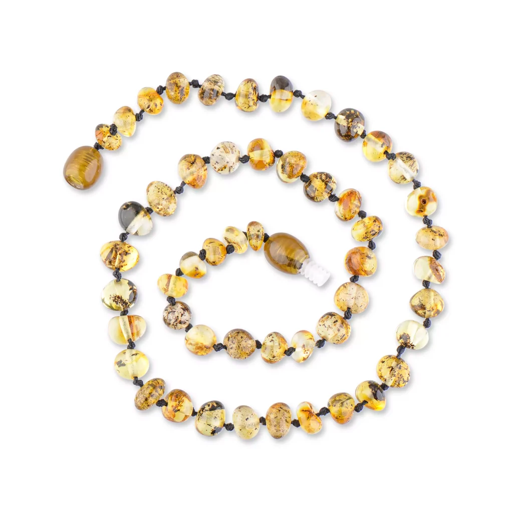 Beautiful handcrafted amber necklace with natural, warm-toned beads and elegant, organic design.