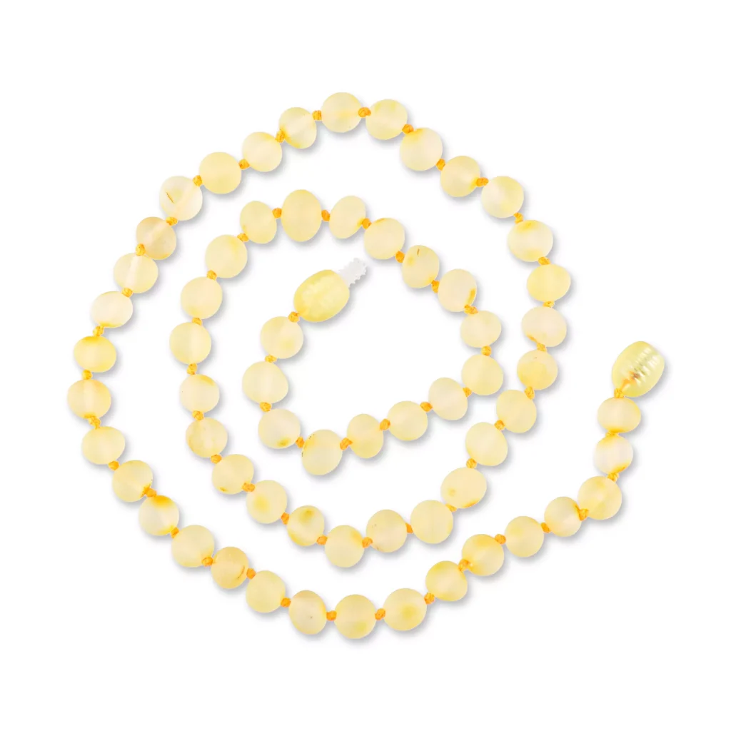Handmade Baltic amber necklace with natural honey-colored beads and elegant spiral design.