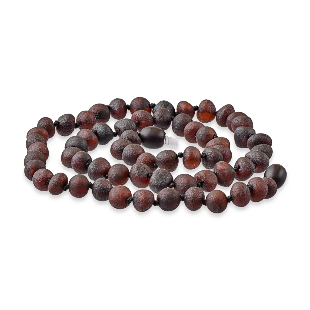 Handmade wooden beaded necklace with natural, polished, organic-style brown and reddish hues.