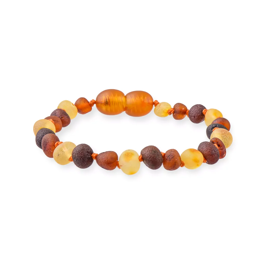 Handmade Baltic amber beaded bracelet with warm gradient and natural, polished earthy tones.