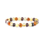 Vibrant amber beaded bracelet with natural hues, polished stones, and elastic stretch for everyday style.