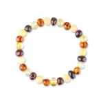 Handmade Baltic amber beaded bracelet with polished, warm natural amber on elastic thread.