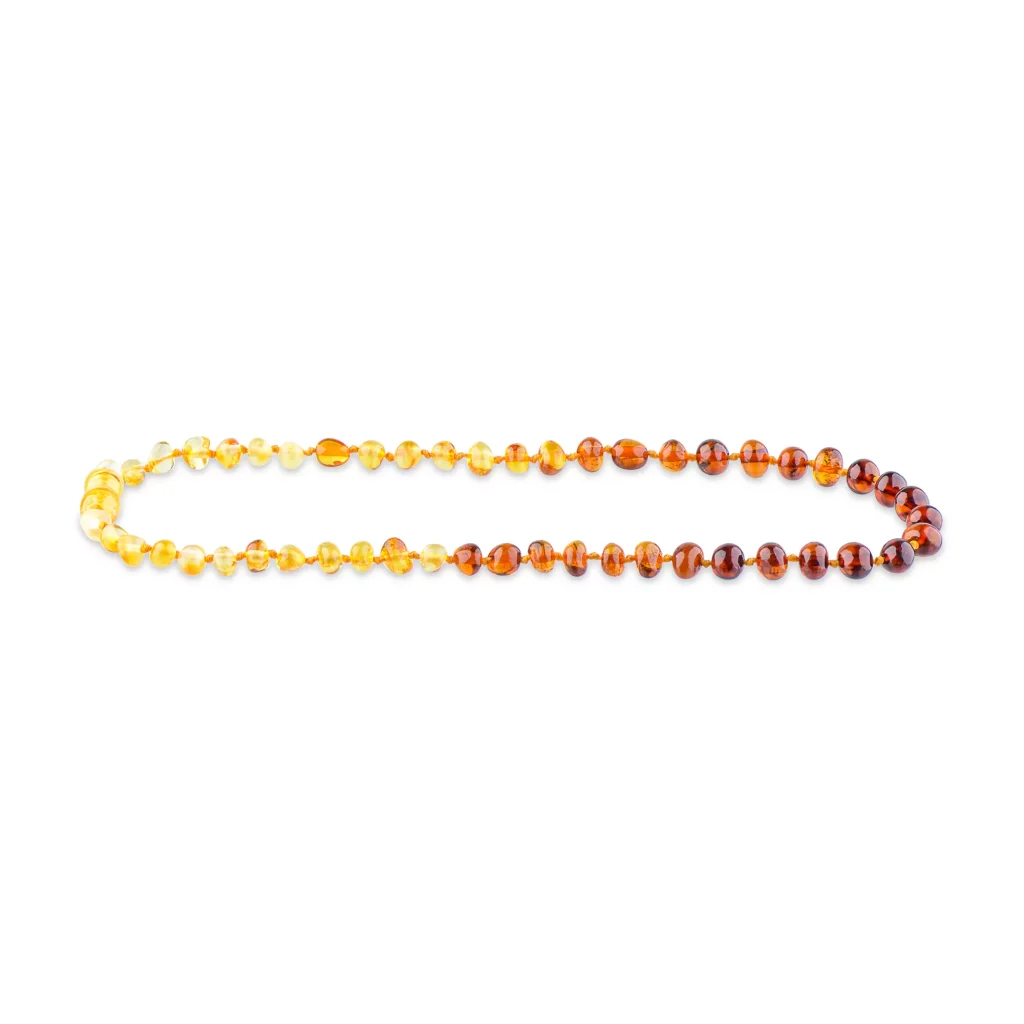 Elegant Baltic amber necklace with gradient colors, handcrafted and versatile for any occasion.
