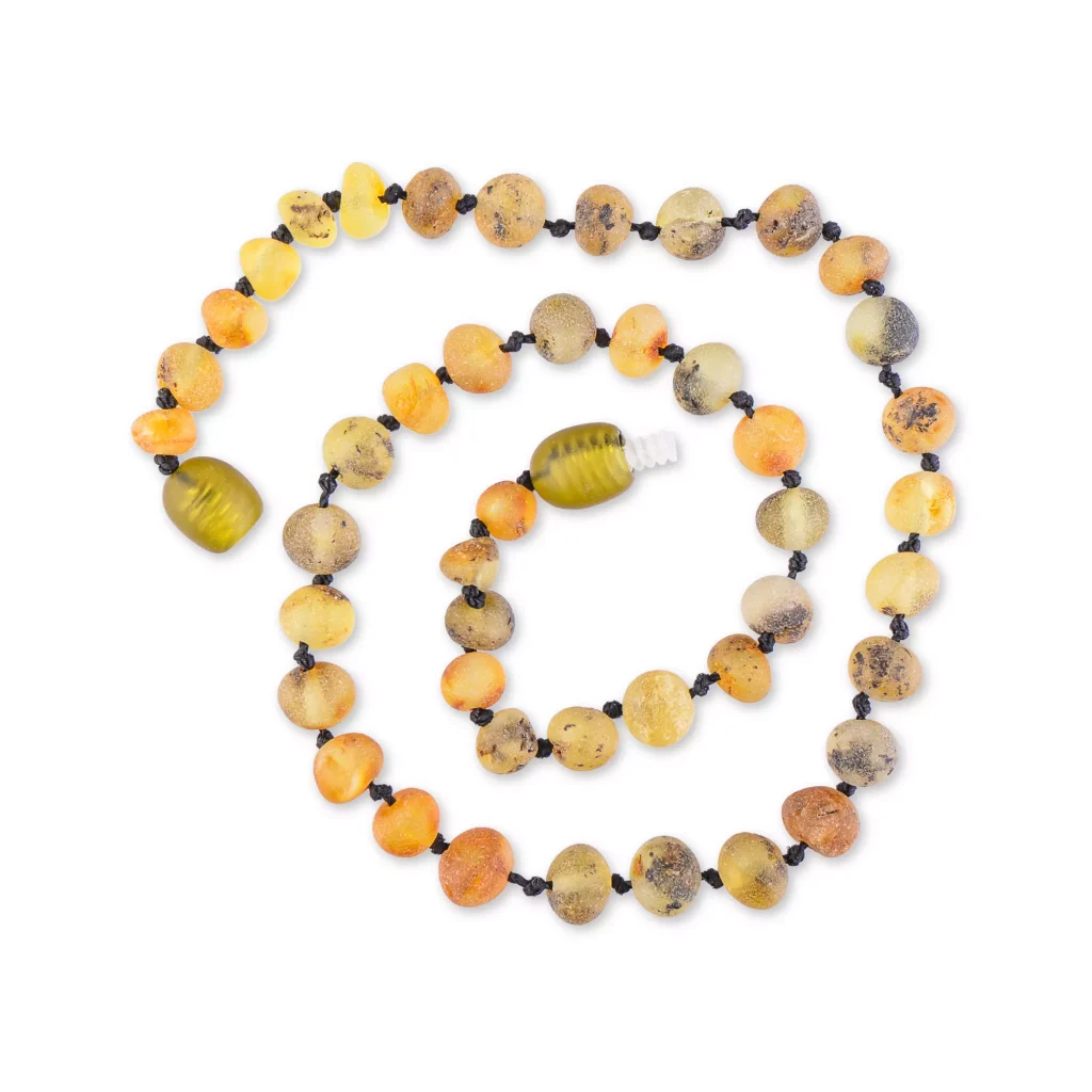 Handcrafted amber necklace in warm earthy tones with unique beads and natural organic charm.