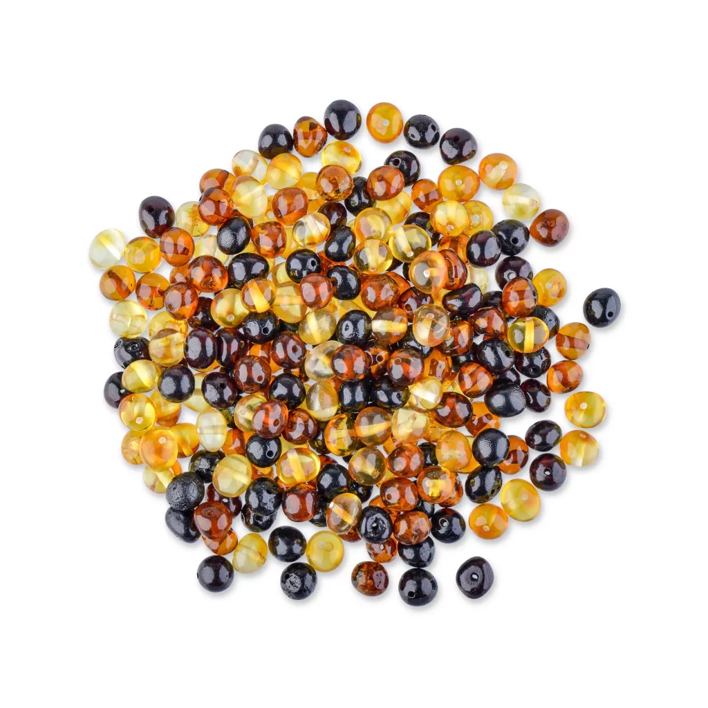 Colorful polished Baltic amber beads, handcrafted for jewelry and decorative accessories.