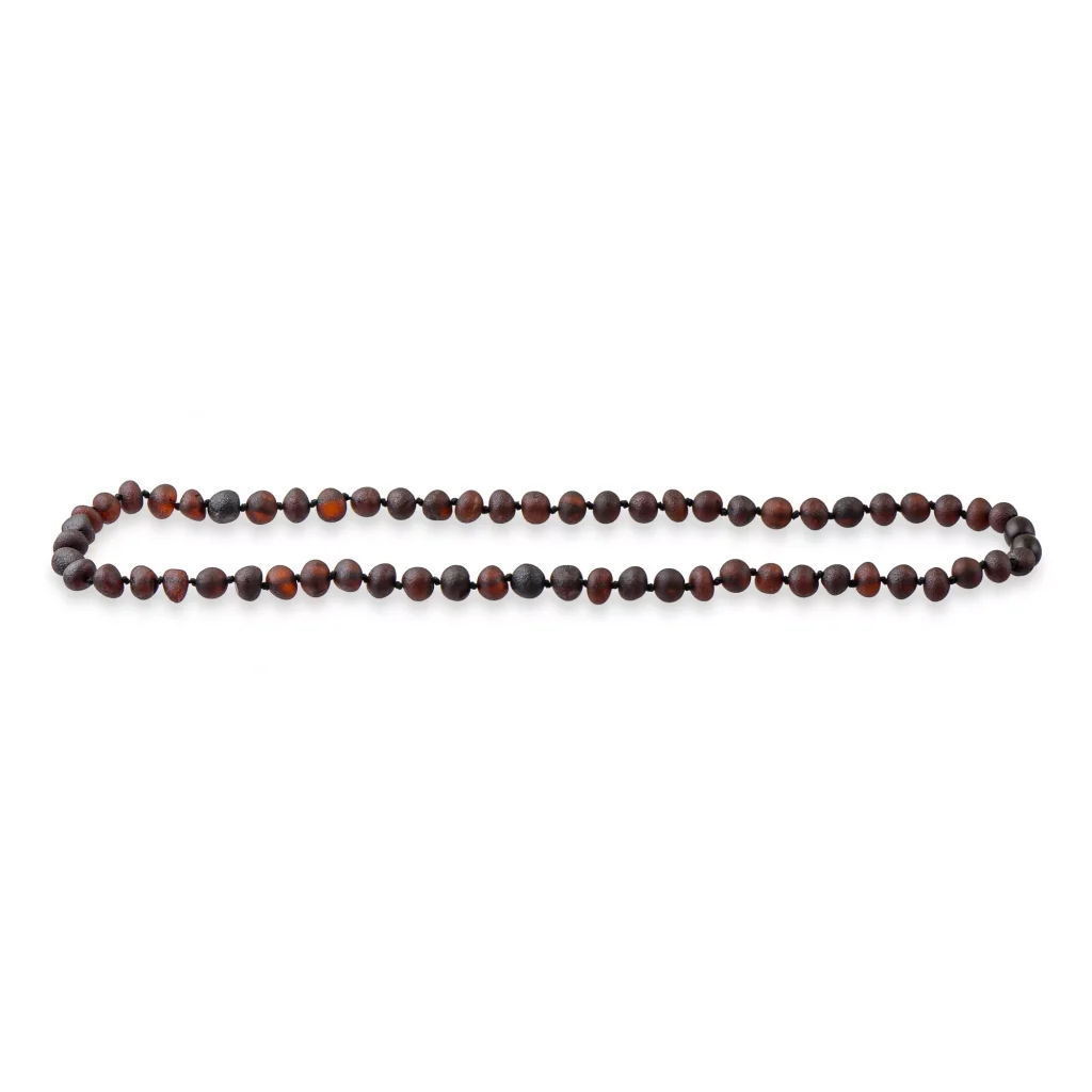 Handmade Baltic amber necklace with natural earth tones and polished, smooth beads.