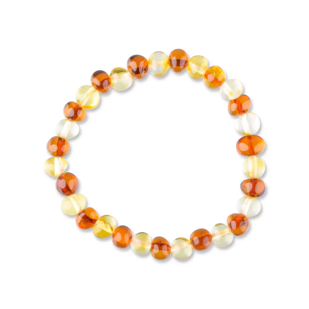 Beaded Baltic amber bracelet with warm tones on stretchy elastic for versatile, elegant wear.