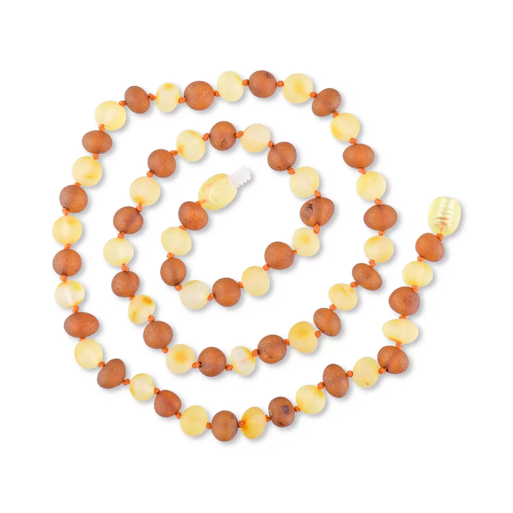 Elegant Baltic amber necklace with warm brown and yellow beads, handcrafted for versatile style.