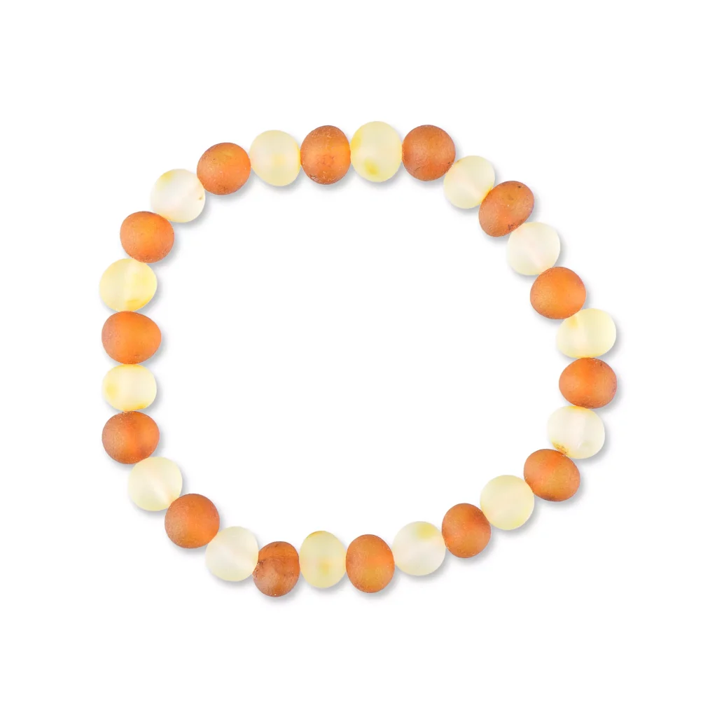 Handmade Baltic amber beaded bracelet with warm peach and white tones for elegant daily wear.