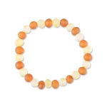 Handmade Baltic amber beaded bracelet with warm peach and white tones for elegant daily wear.