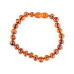 Elegant polished amber bracelet with warm, natural hues and a secure clasp.