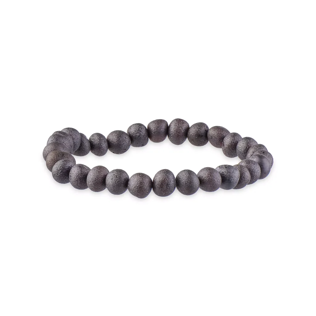 Minimalist black beaded stretch bracelet with polished wooden beads, versatile and elegant accessory.