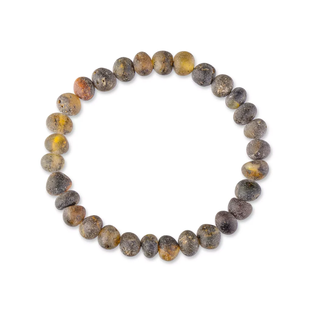 Handmade natural gemstone beaded bracelet with earthy tones and polished, organic design.