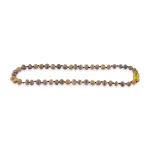 Handmade earthy Baltic amber necklace with yellow focal bead, natural, polished, elegant jewelry art.