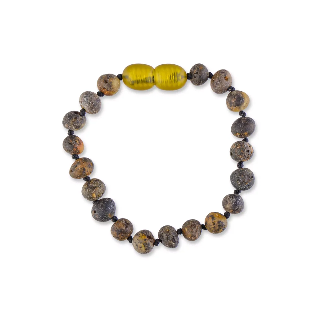 Handmade Baltic amber necklace with earthy tones and vibrant yellow accents.
