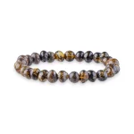 Natural amber bead bracelet with warm earthy tones and polished, organic craftsmanship.