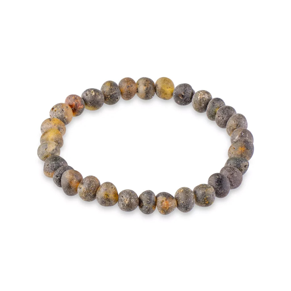 Handmade earthy-tone stone beaded bracelet with polished finish on elastic for versatile style.