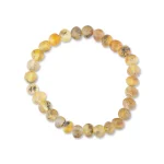 Natural stone beaded bracelet with earthy tones and polished, organic design for stylish everyday wear.