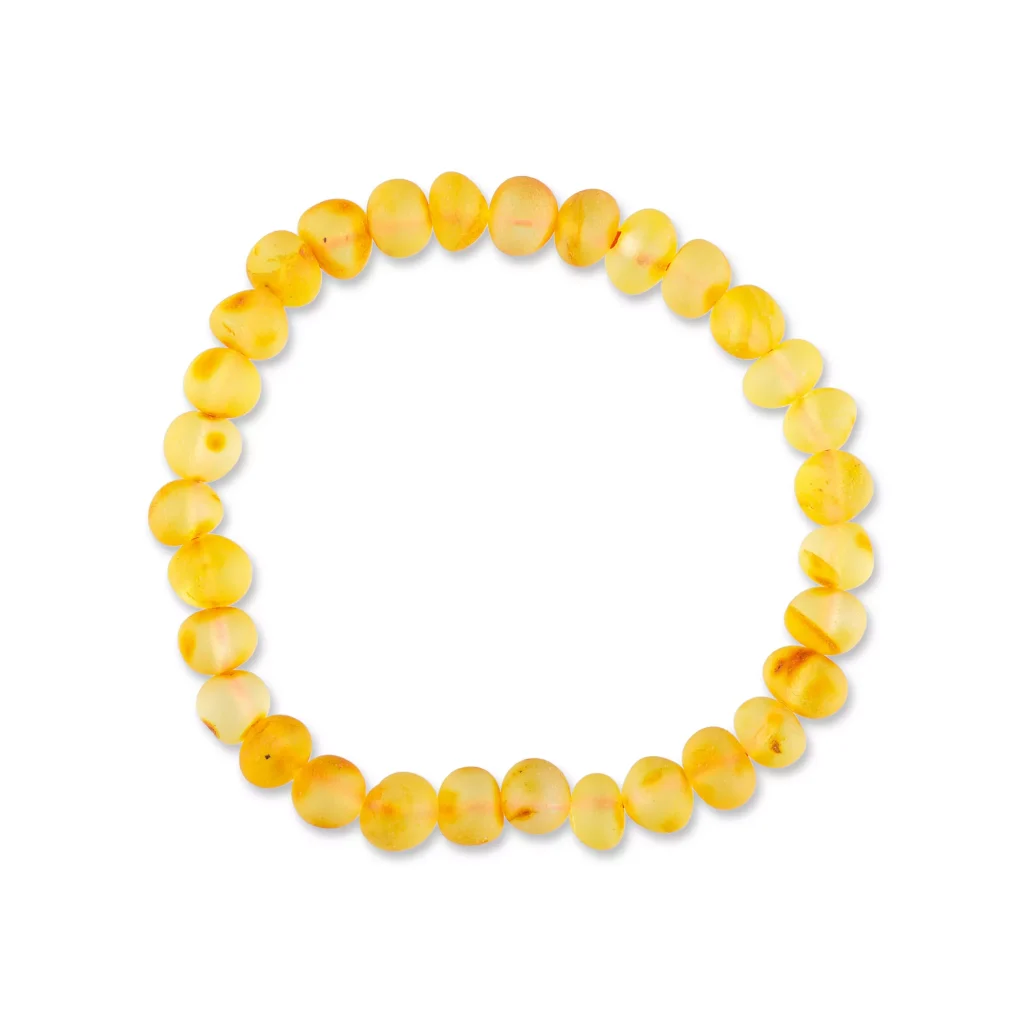 Warm yellow Baltic amber bracelet with polished beads on elastic, perfect for stylish everyday wear.