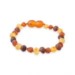 Handcrafted amber beaded bracelet with warm, natural tones and varied shapes for everyday elegance.