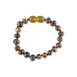 Handcrafted amber beaded bracelet with natural inclusions and warm golden hues.