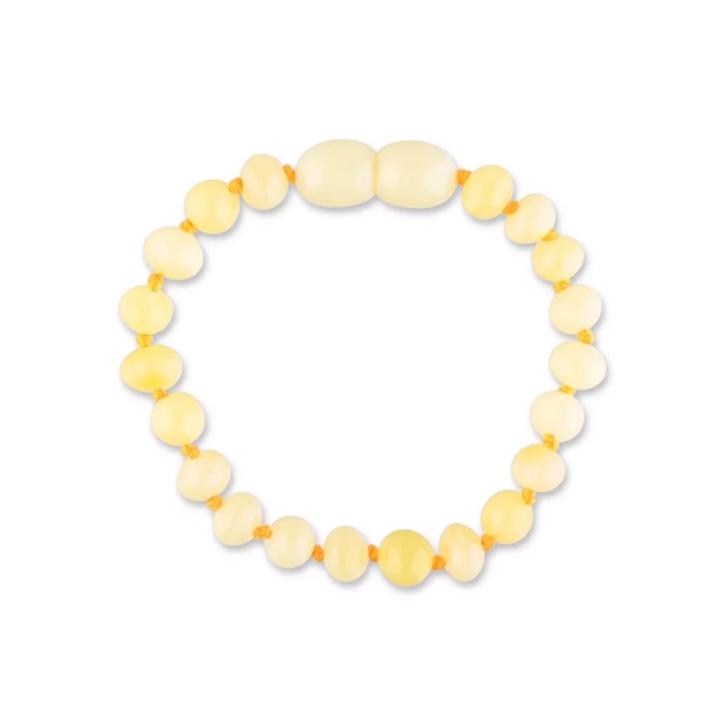 Soft yellow beaded bracelet with oval and round polished beads, stretchy and elegant for everyday wear.