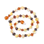 Elegant Baltic amber necklace with warm golden tones and polished, natural beads for versatile style.
