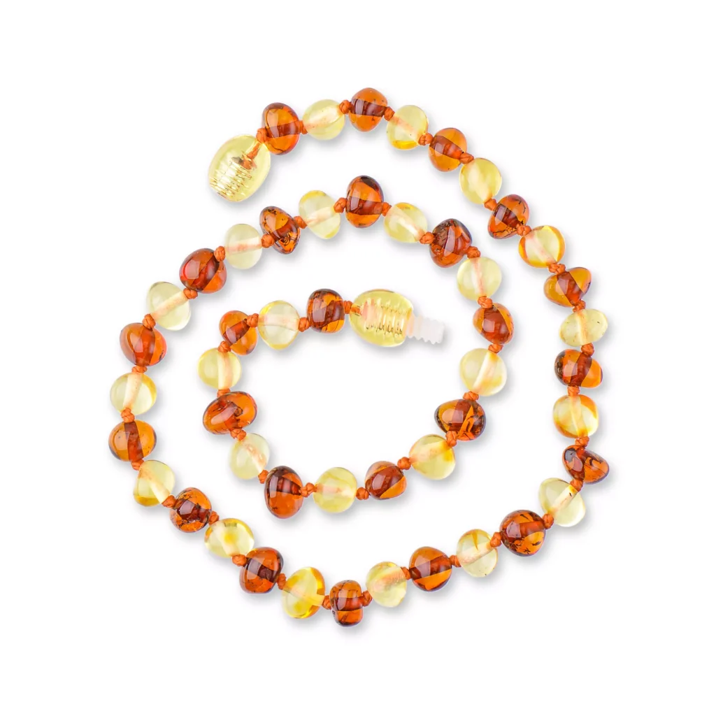 Elegant handmade Baltic amber necklace with warm spiral design and natural yellow and amber beads.
