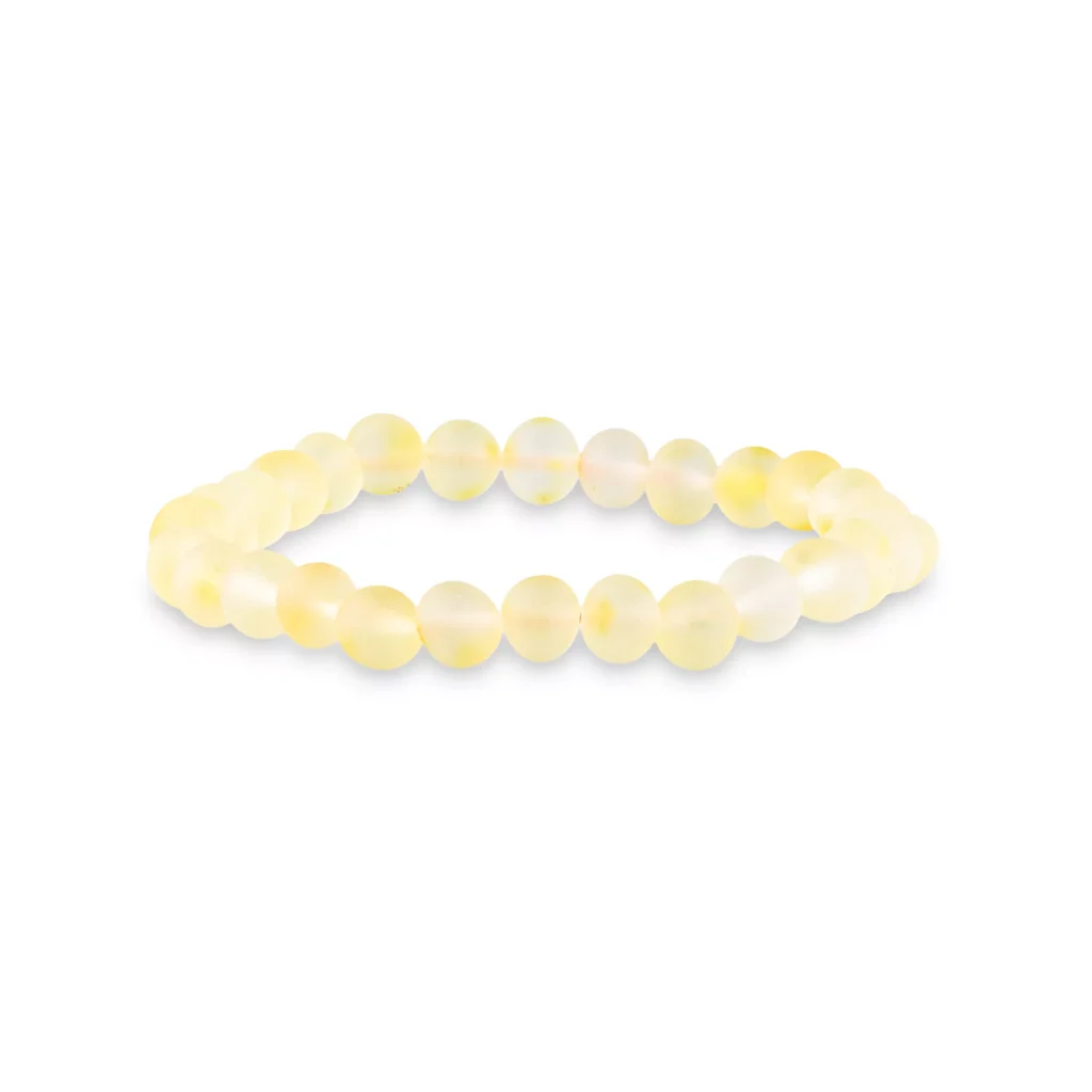 Soft yellow beaded stretch bracelet with polished, calming, and elegant design for any occasion.