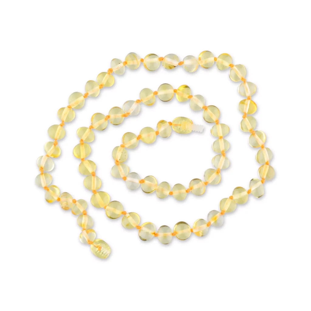 Soft yellow amber beads on a delicate, handmade necklace, perfect for spiritual or everyday wear.