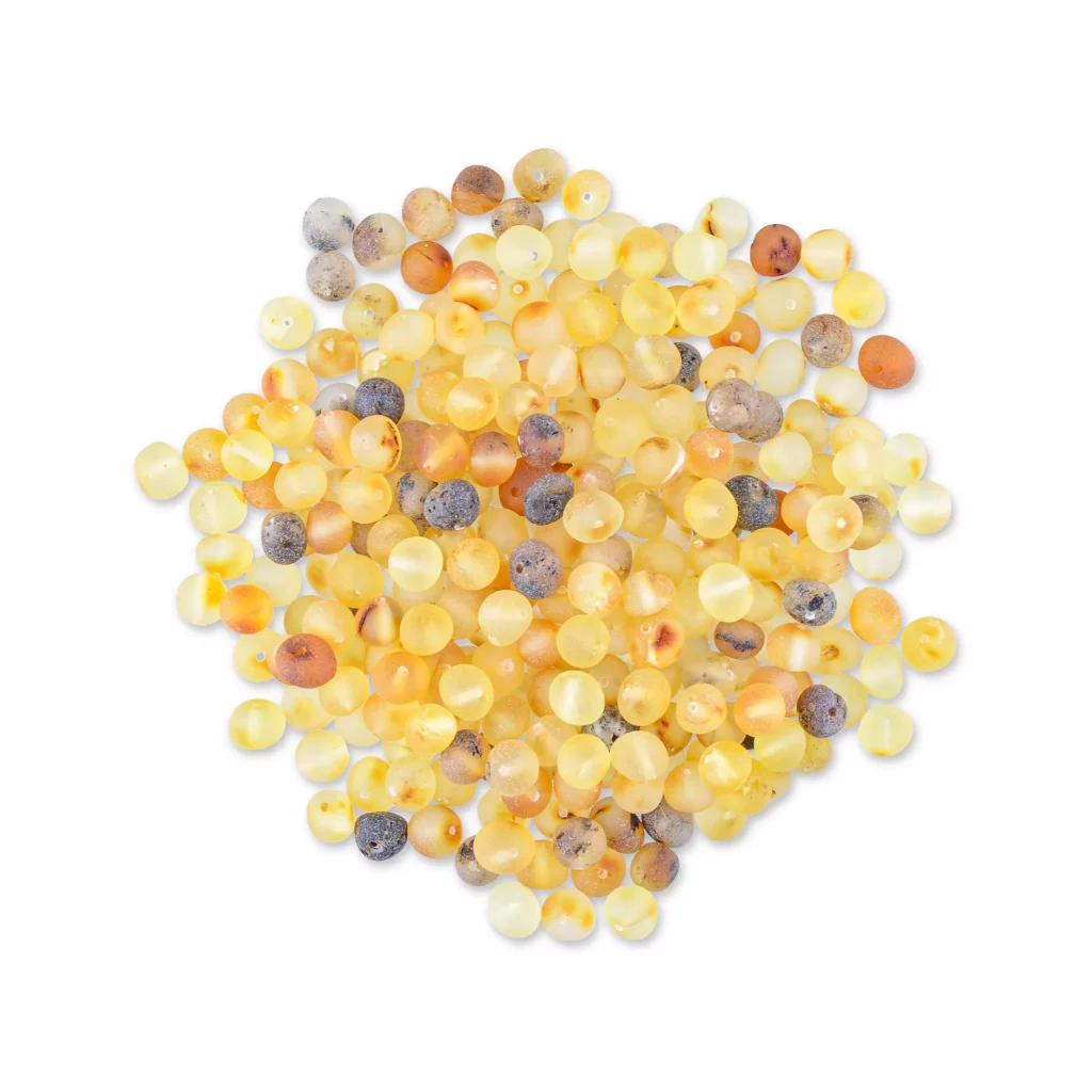 Vibrant yellow beads with subtle brown and gray accents, glossy, polished, perfect for jewelry making.