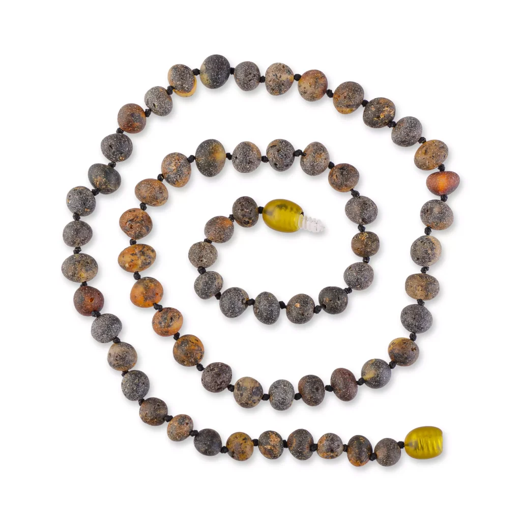Handmade earthy Baltic amber necklace with textured beads and vibrant focal bead.