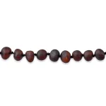 Handmade natural wooden bead necklace with earthy tones and organic, smooth pebble-like design.