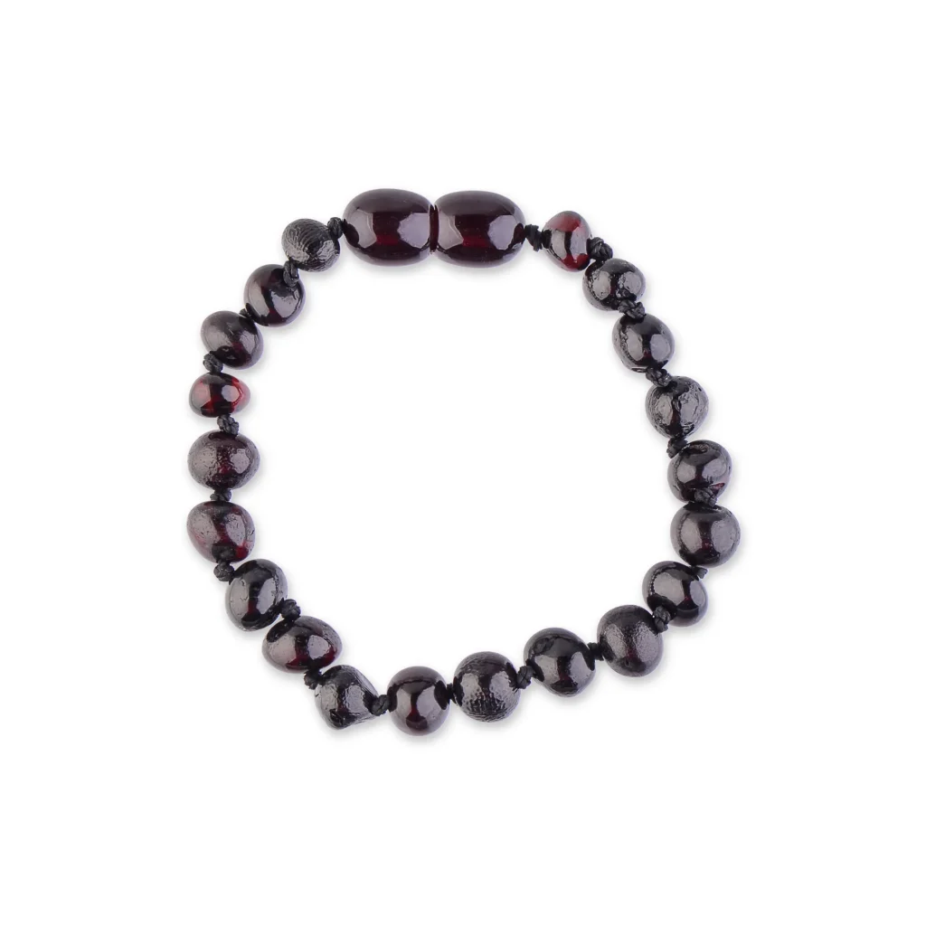 Elegant black beaded bracelet with polished glossy beads, perfect for versatile, timeless style.
