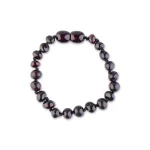 Elegant black beaded bracelet with polished glossy beads, perfect for versatile, timeless style.