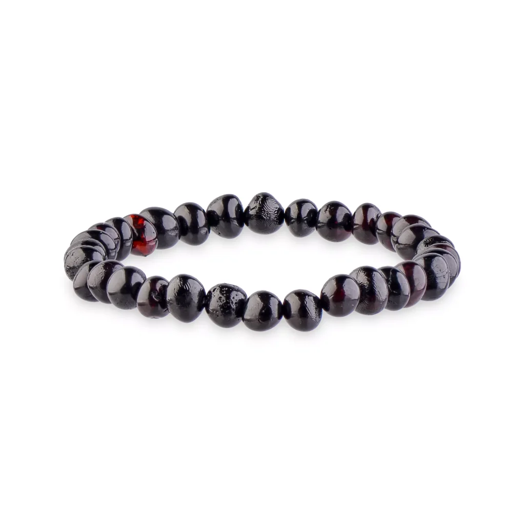 Black and red beaded bracelet with polished, glossy stones on elastic for everyday elegance.