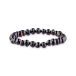 Black and red beaded bracelet with polished, glossy stones on elastic for everyday elegance.